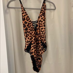 Buckle one piece suit